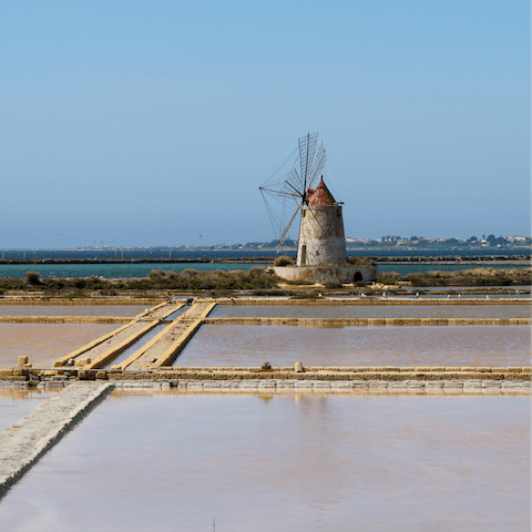 Visit the salt pans of Trapani and Marsala – just a short drive away
