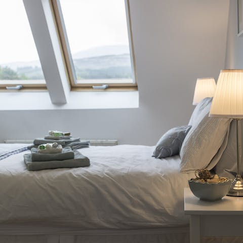 Wake up each morning in the main suite and admire the view of the surrounding mountains