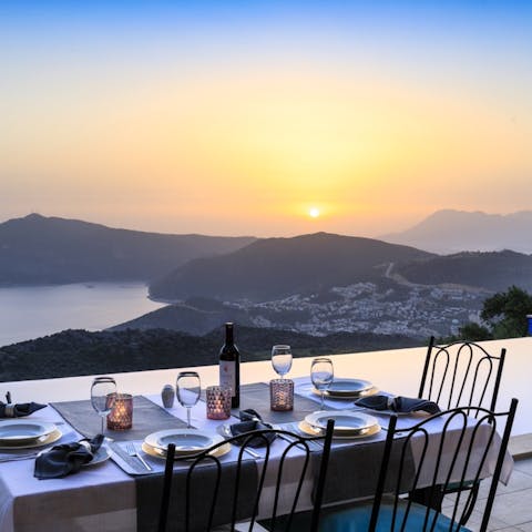 Watch the sun go down as you enjoy some food on the balcony