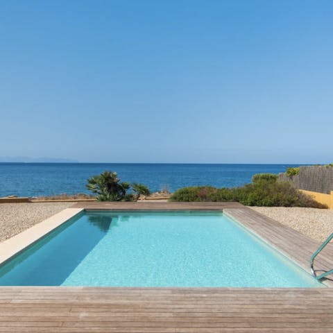 Take in the stunning views of the Mediterranean Sea from the private pool 