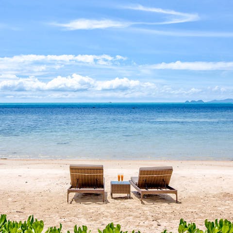 Enjoy the serenity of Mandalay Beach just in front of your villa's garden