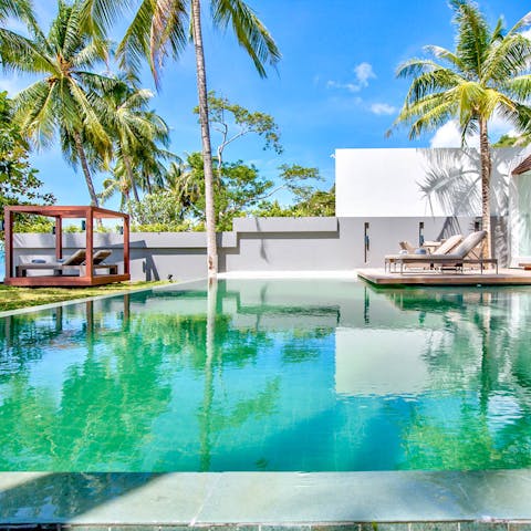 While away luxurious afternoons in the private infinity pool