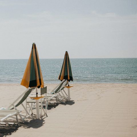 Head down to Santa Maria del Focallo Beach, just footsteps from your door