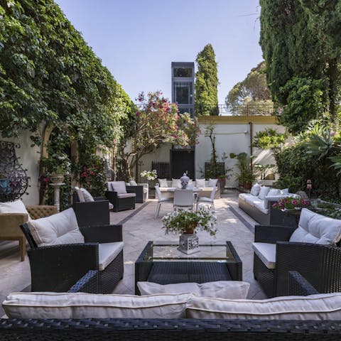 Take your evening tipple in the peaceful courtyard surrounded by greenery