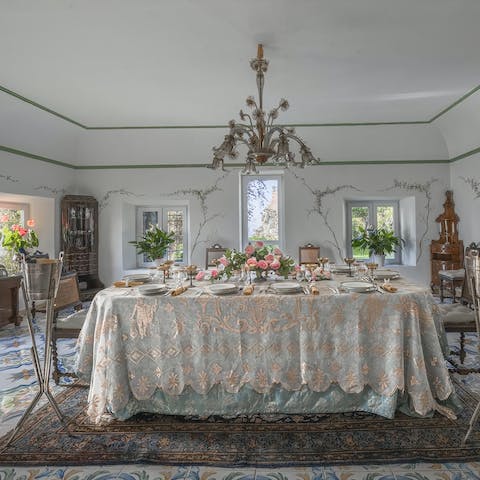 Enjoy big group meals in the charming dining room beneath the chandelier