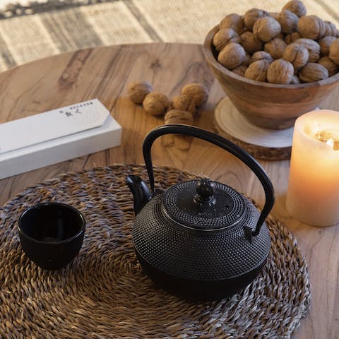Pour a reviving cup of tea from the traditional cast iron pot
