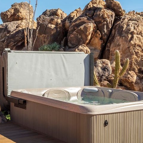 Unwind in the secluded hot tub