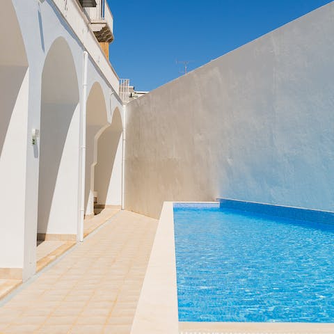 Cool off from the midday sun in the communal pool