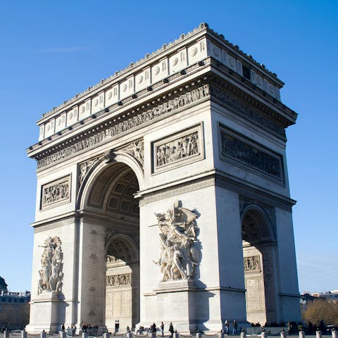 Visit the nearby Arc de Triomphe, a must-see while in Paris