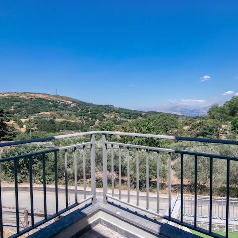 Stand on one of the balconies and gaze out over mountainous views