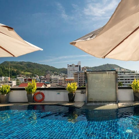 Cool off from the tropical temperatures with a dip in the communal rooftop pool 