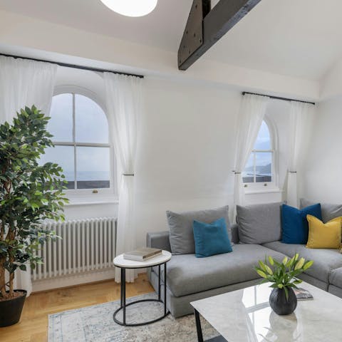 Admire sea views from this elegant fourth-floor apartment