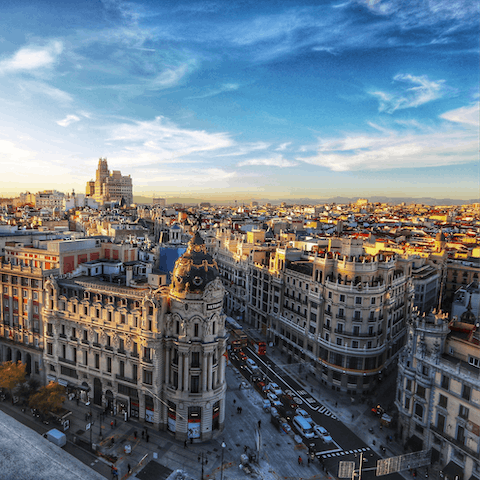 Explore the vibrant city of Madrid from your location in elegant Justicia