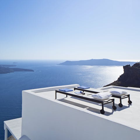 Feel on top of the world while sunbathing on the panoramic rooftop terrace