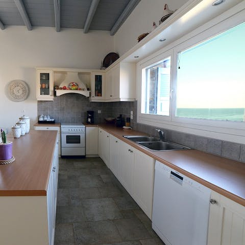 Prepare dinner while gazing out at the Ionian Sea through the kitchen window