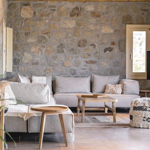 Grab a book and take advantage of the bright lounge by getting comfortable on the sofa