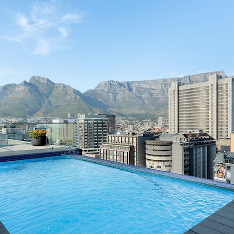 Take in mountain views from the communal rooftop pool