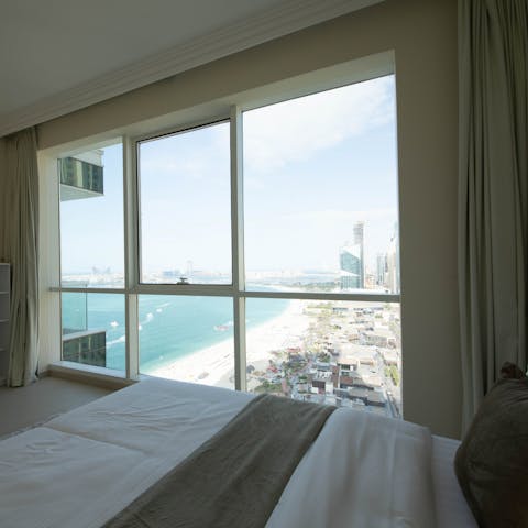 Wake up to glorious views of the Gulf from the floor-to-ceiling bedroom windows