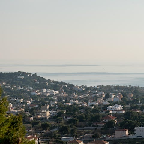 Fall in love with the views across Agios Dimitrios to the sea