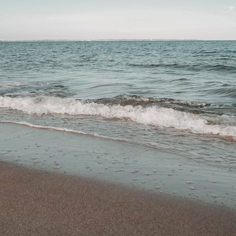 Drive five minutes to Althea Beach and feel the sand between your toes