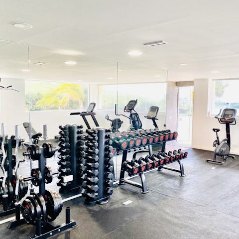 Get your heart racing with a cardio workout in the communal on-site gym