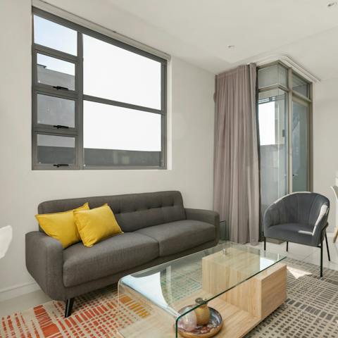 Stretch out in the living area after a day of soaking up the city's sights