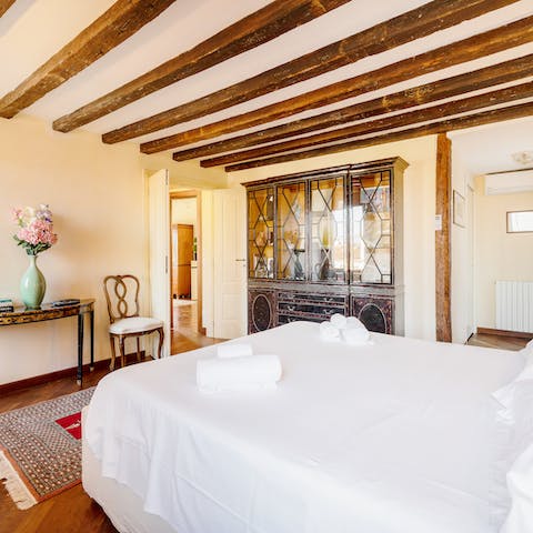 Sleep soundly surrounded by elegant antique furniture and characterful exposed beams
