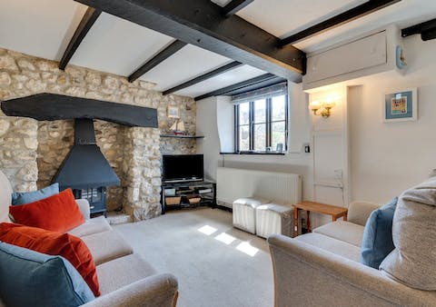 Snuggle up in front of the fire after a busy day on the Devon coast