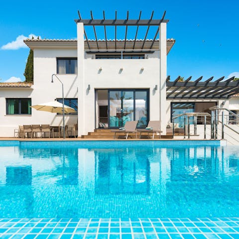 Slip into your swimwear and jump into the villa's infinity pool