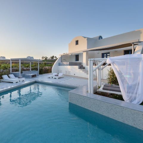 Immerse yourself in the idyllic beauty of Santorini from this home in Megalochori