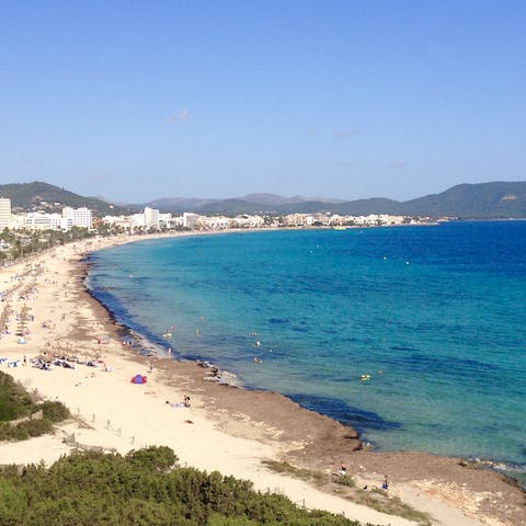 Mosey down to Cala Millor's beach, it's just a eight-minute stroll away