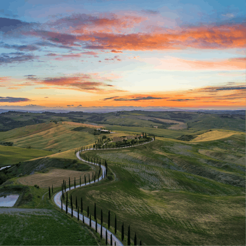 Explore the stunning rolling hills of Tuscany