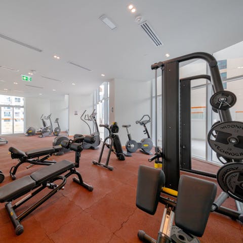 Squeeze in a quick workout in the building's communal gym before a meeting