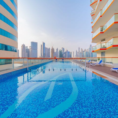 Head down to the ground floor for a refreshing swim in the shared pool