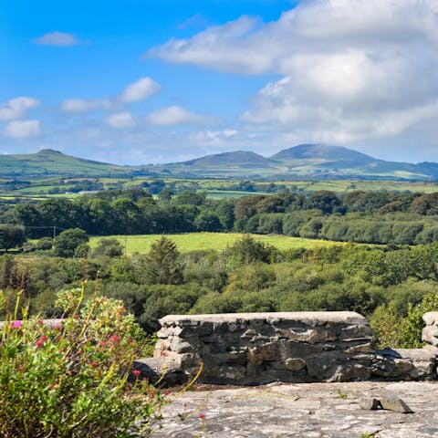 Discover panoramic views of Cardigan Bay and distant mountains from every corner of the expansive grounds
