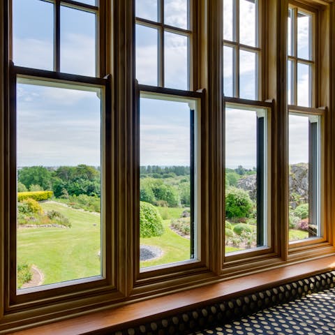 Admire breathtaking views of rolling countryside from the windows