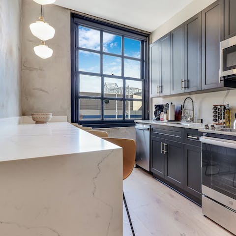 Enjoy breakfast on the sleek marble dining table