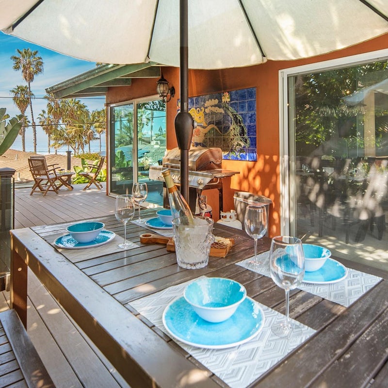 Light up the grill, pour the drinks and raise a glass to the beauty of coastal living