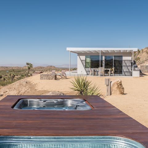 Relax in the hot tub as you admire the view