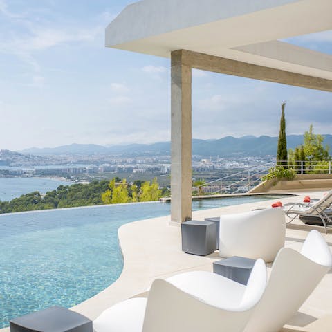 Relax beside the contemporary infinity pool, overlooking the sweeping view