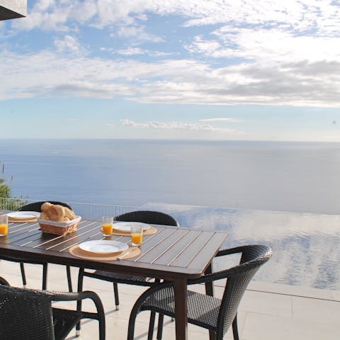 Enjoy alfresco dining surrounded by breathtaking sea views as far as the eye can see