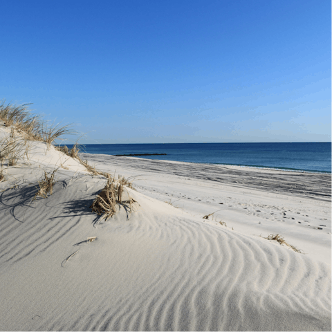 Stay just a five-minute drive away from Barnes Hole Beach 
