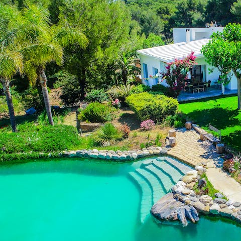 Cool off from the Spanish heat in the private lake pool