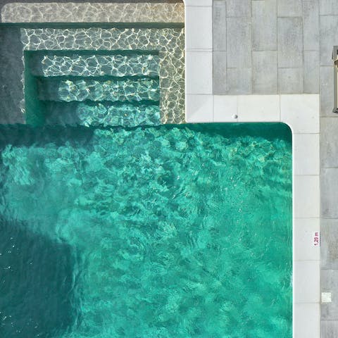 Dive into the swimming pool for a refreshing dip