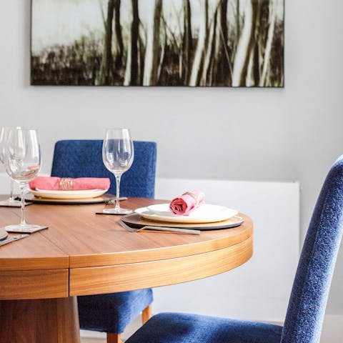 Enjoy a delicious meal around the stylish dining table
