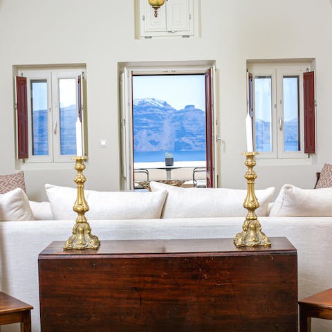 Admire the views out of the window from the opulent lounge area