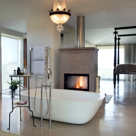 Treat yourself to a long soak in the master bedroom's elegant freestanding bathtub