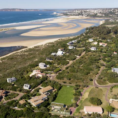 Drive over to Keurbooms Beach in five minutes and try your hand at surfing