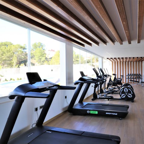 Stay on top of your fitness regime with a session in the shared on-site gym