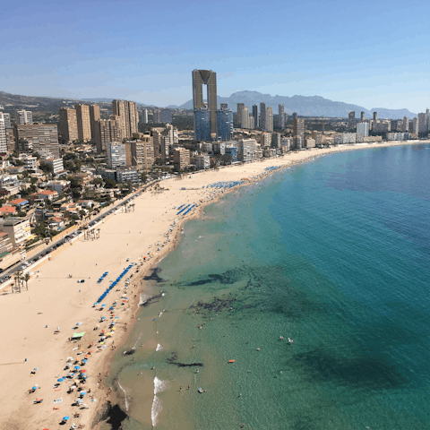 Sunbathe and swim on the beautiful beaches of Benidorm, just a short stroll from your accommodation